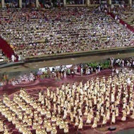 mohiniyattam artists performing on the large stadium ground